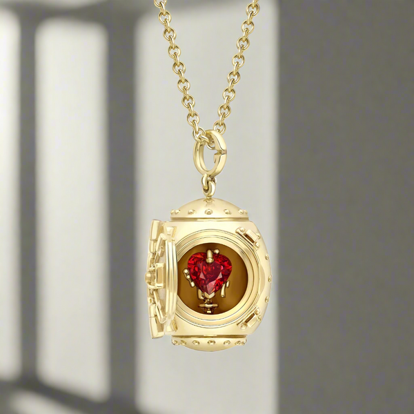 Fabergé x 007 Goldfinger Egg Safe Locket with Ruby Heart | 007Store